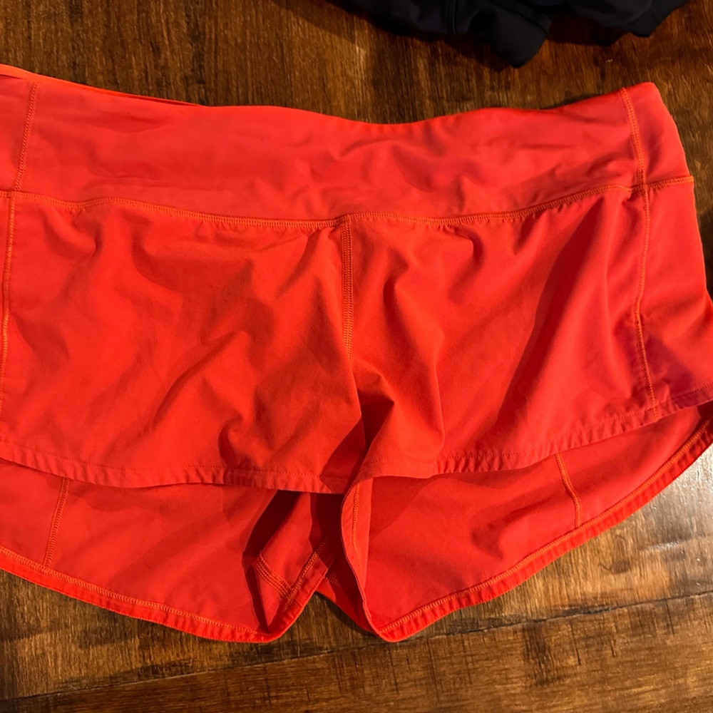 Lululemon speed up low rise short size 10. Red.